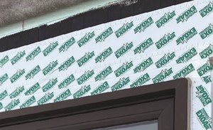 A sheet membrane with the ExoAir logo surrounds a window